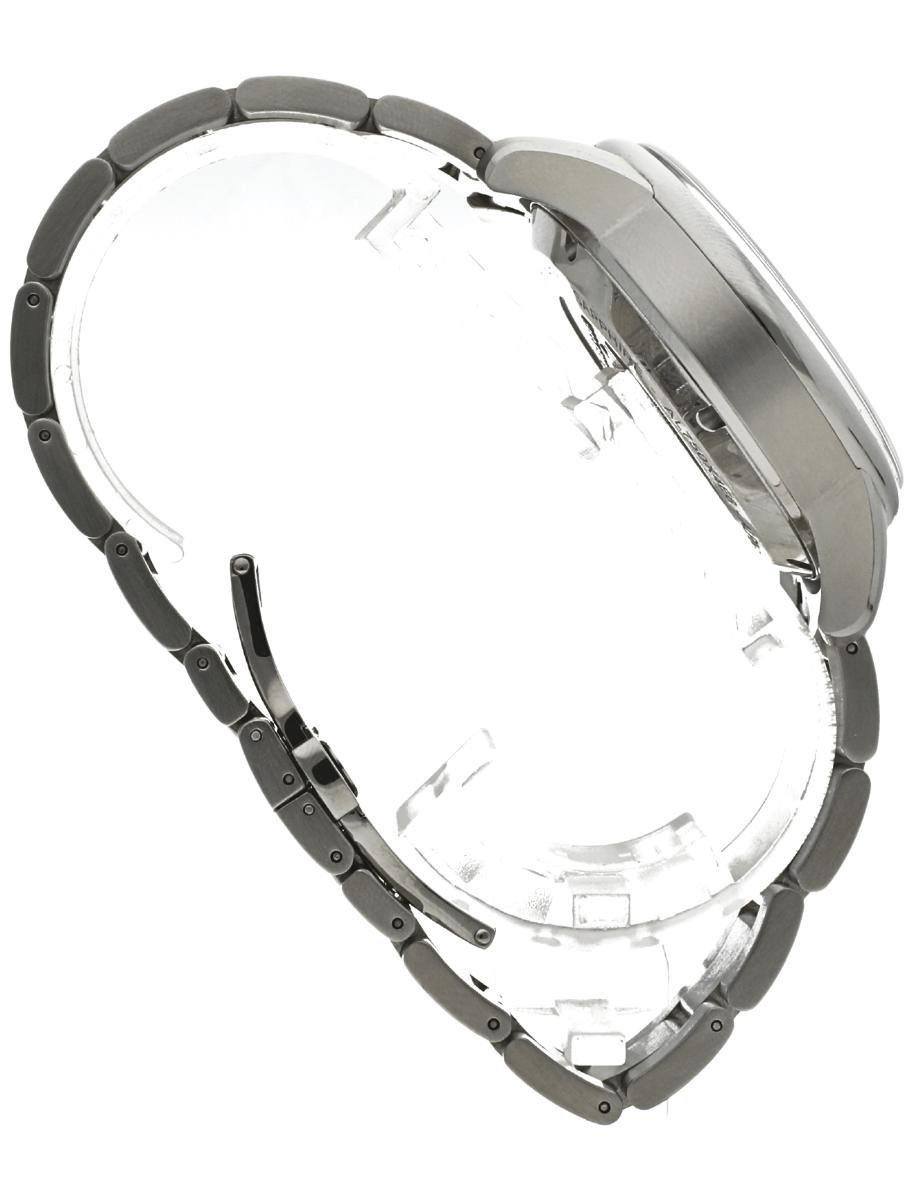 Side view of a pre-owned metal wristwatch with a linked bracelet and exposed inner case, showing the round watch face and metal band.