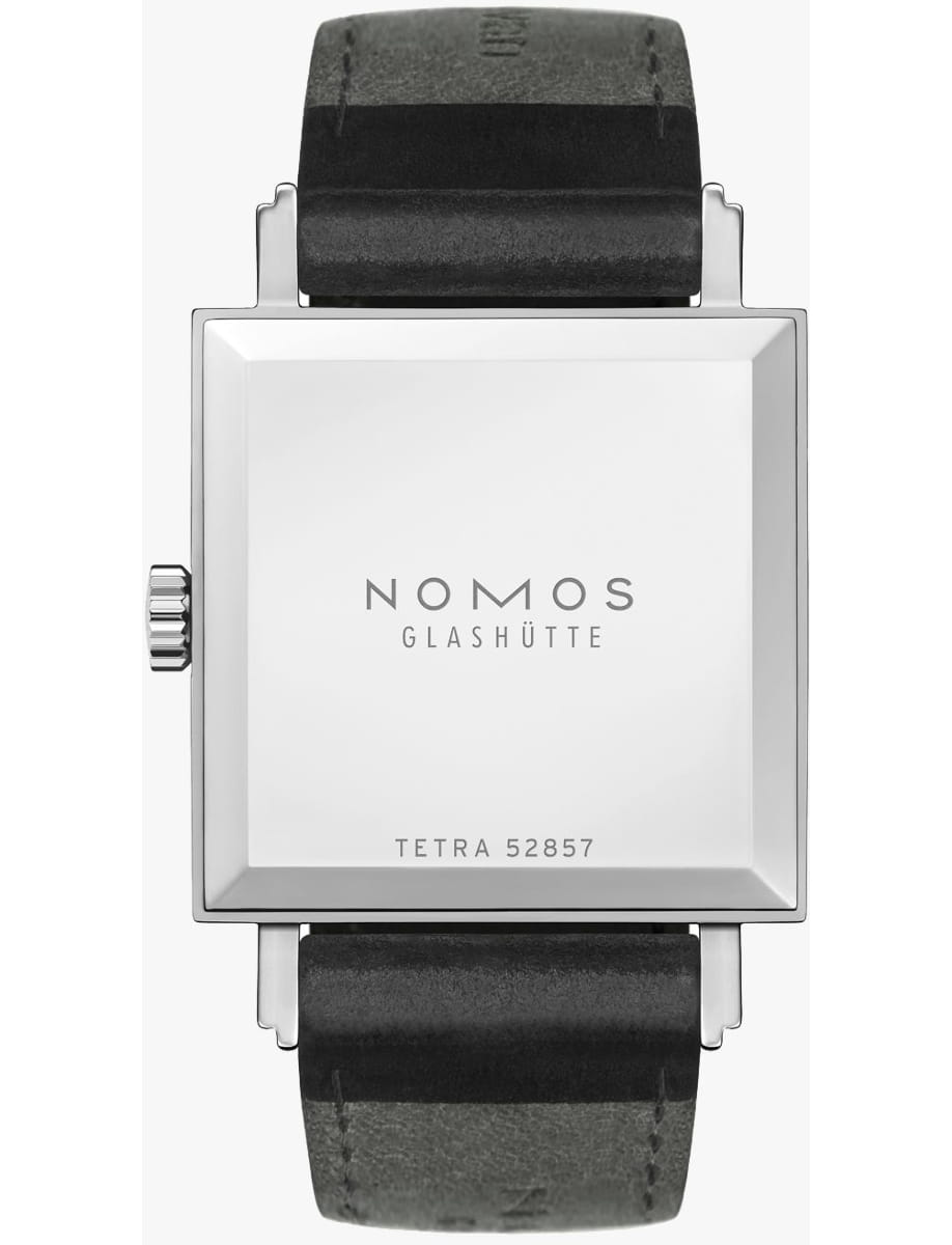Square NOMOS Glashütte Tetra watch viewed from the back with a black leather strap.