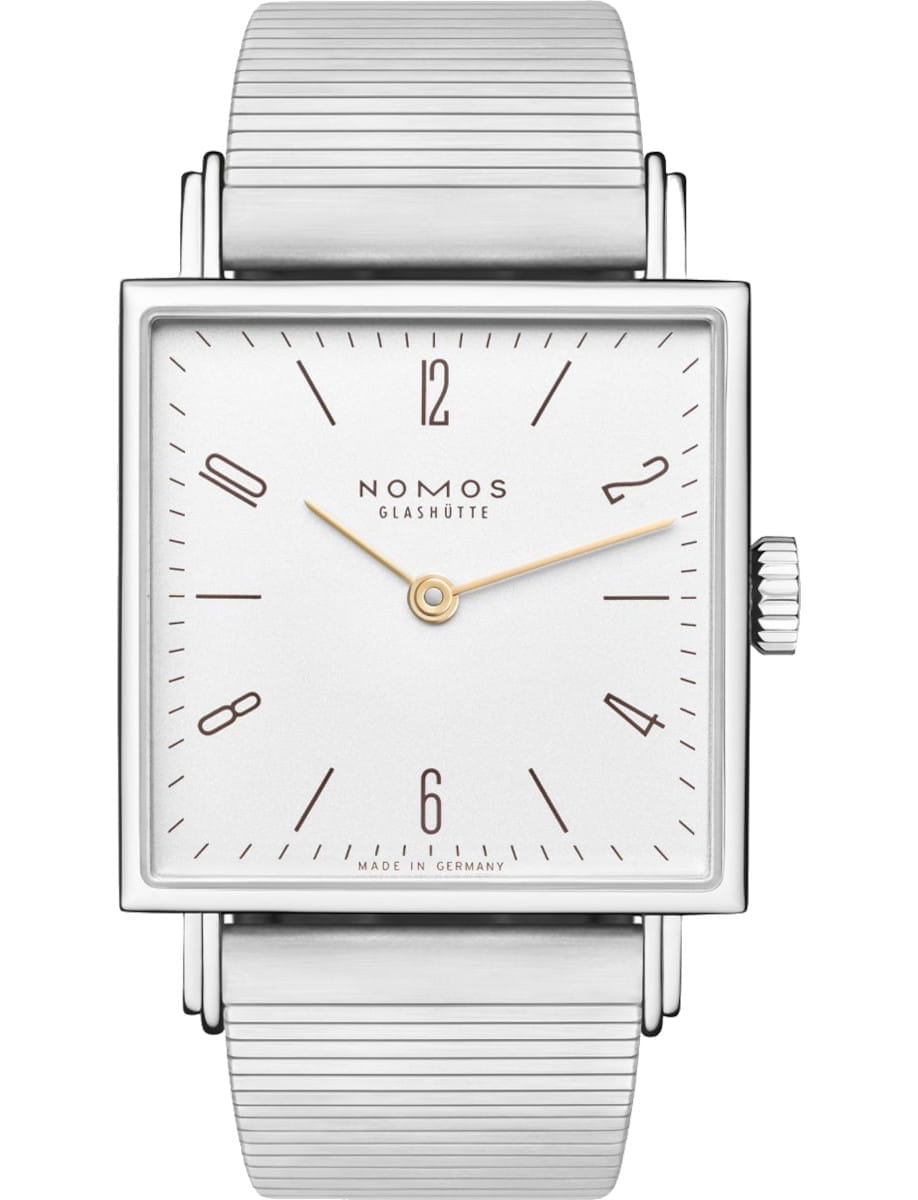 Square silver wristwatch with a white dial, gold hands, brown hour markers, and a metallic expansion band (Nomos Glashütte).