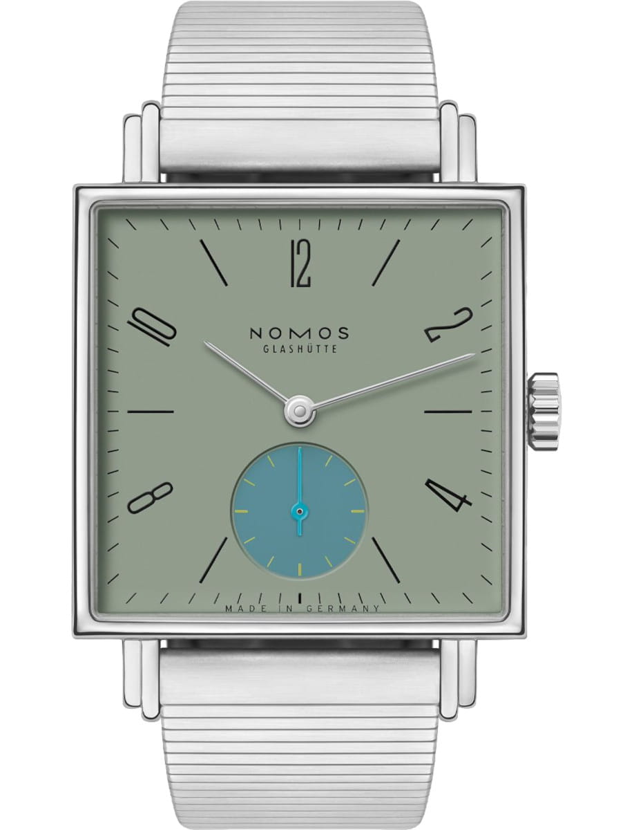 Square-faced Nomos Glashütte wristwatch with a sage green dial, silver hands, and a blue subdial at 6 o'clock on a metal bracelet
