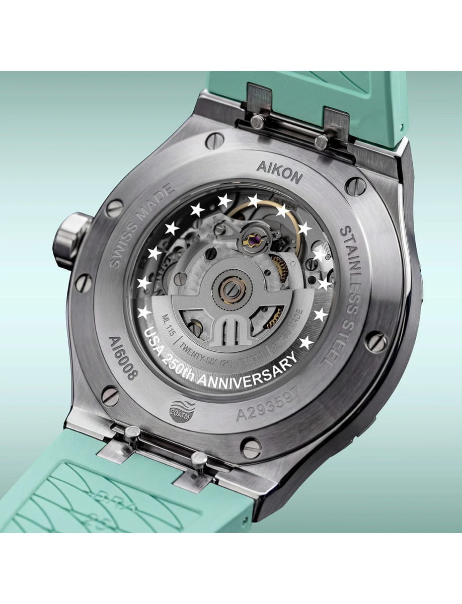 Back view of Maurice Lacroix Aikon Liberty wristwatch with stainless steel case, Bartholdi Green rubber strap, and open case back.