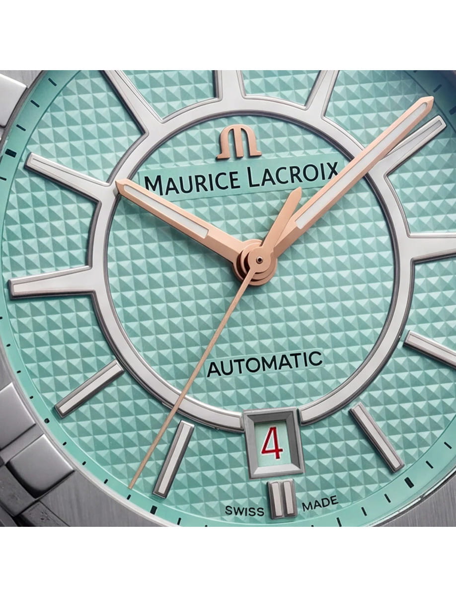 Close view of Maurice Lacroix Aikon Liberty wristwatch with stainless steel case, Bartholdi Green dial and rubber strap.
