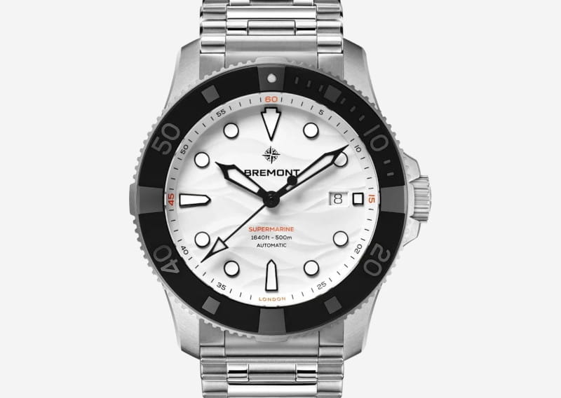 Bremont Supermarine stainless steel dive watch with white dial and black bezel showing date window at 3 o'clock