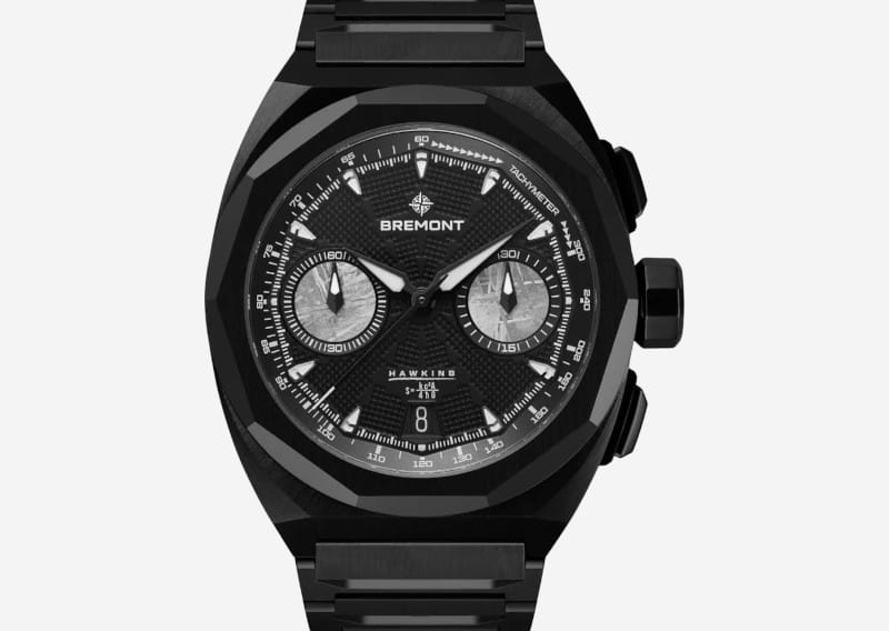 Black Bremont Hawking chronograph watch with two silver subdials, textured dial, and date window at 6 o'clock on a black bracelet.