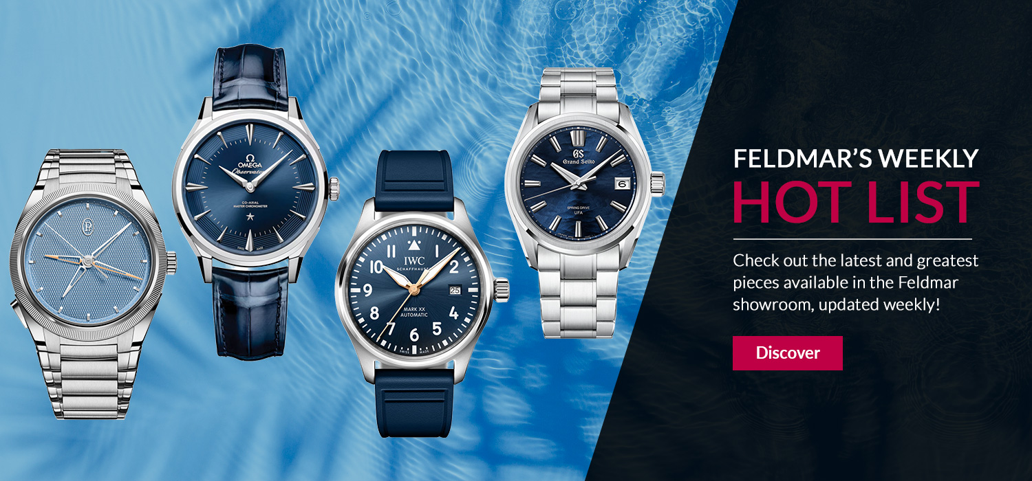 Promotional banner for Feldmar featuring four luxury watches on a blue background with a dark panel showing 'Feldmar’s Weekly HOT LIST' and a pink 'Discover' button.