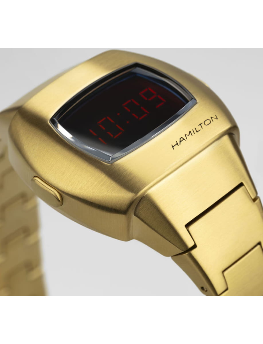 Gold Hamilton digital wristwatch with a red LED time display on a gold bracelet.