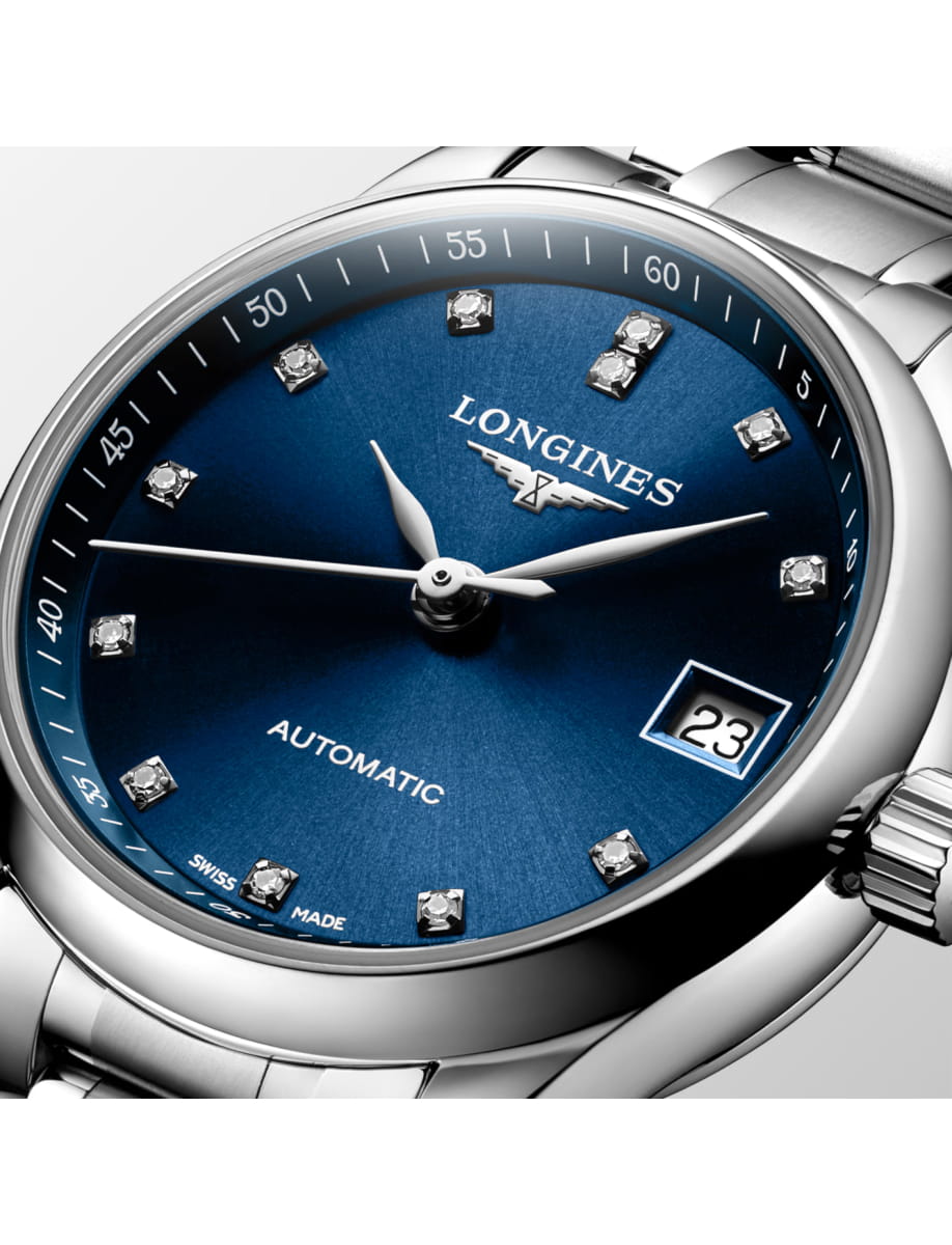 Longines automatic wristwatch with a blue dial, diamond hour markers, and date window