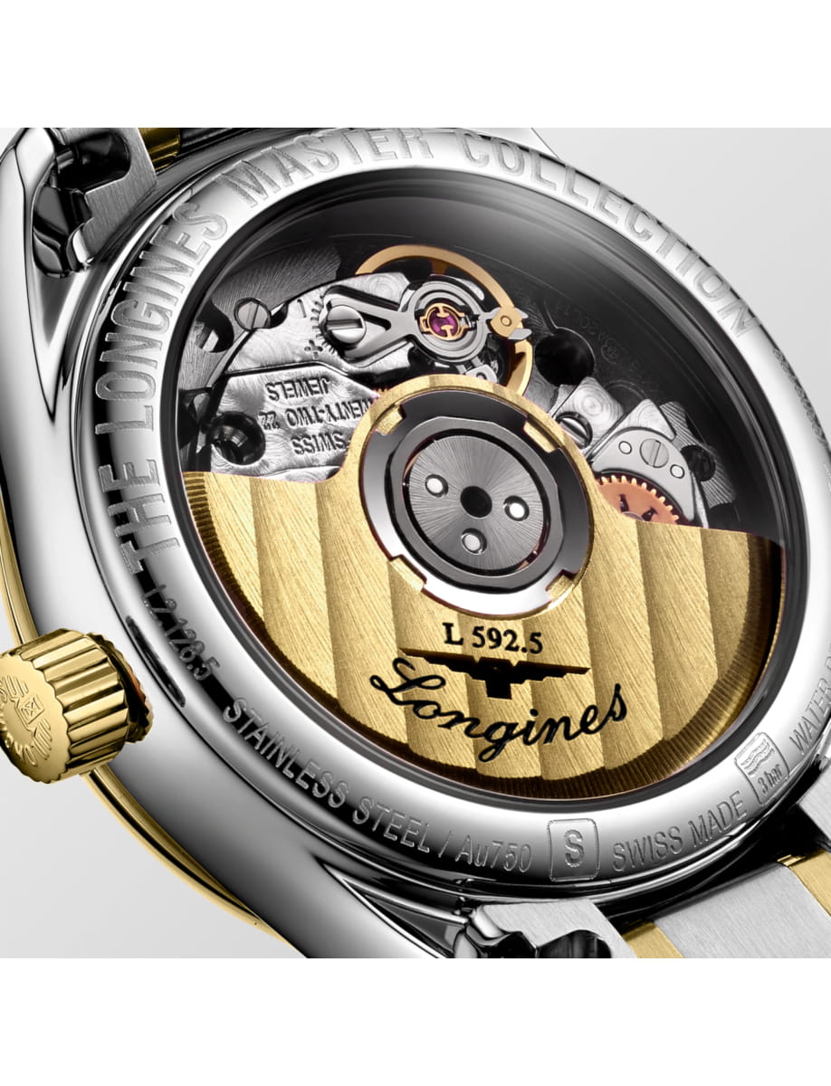 Back of a Longines mechanical watch showing the exposed movement and gold rotor through a transparent case back.