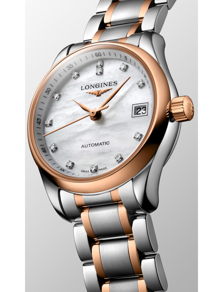 Two-tone Longines automatic wristwatch with diamond hour markers and date window on a mother-of-pearl dial.