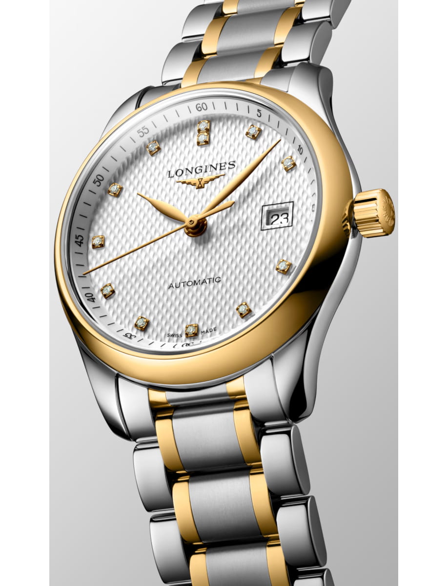Two-tone wristwatch with silver and gold bracelet, white patterned dial, diamond hour markers, date window at 3 o'clock, and 'Automatic' inscription.
