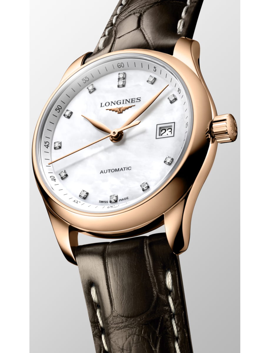Rose gold Longines automatic watch with a white mother-of-pearl dial and diamond hour markers on a brown leather strap.