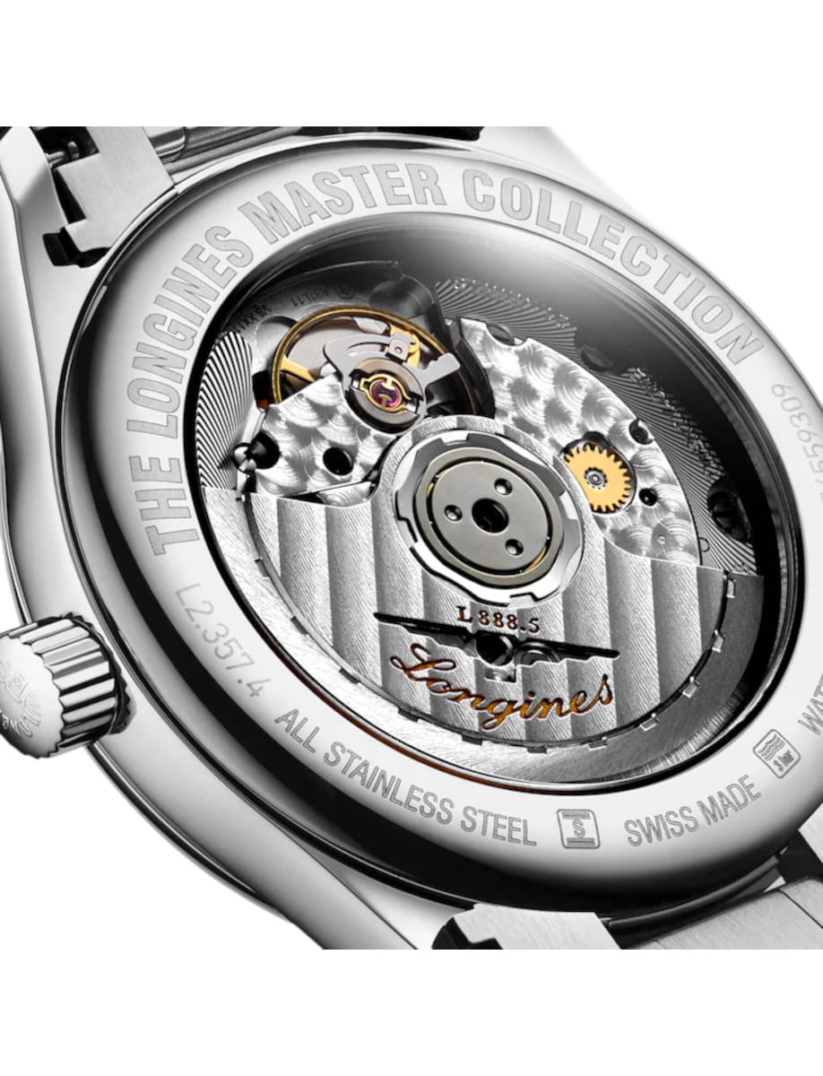 Back view of a stainless steel Longines watch, revealing the intricate mechanical movement through the transparent caseback.