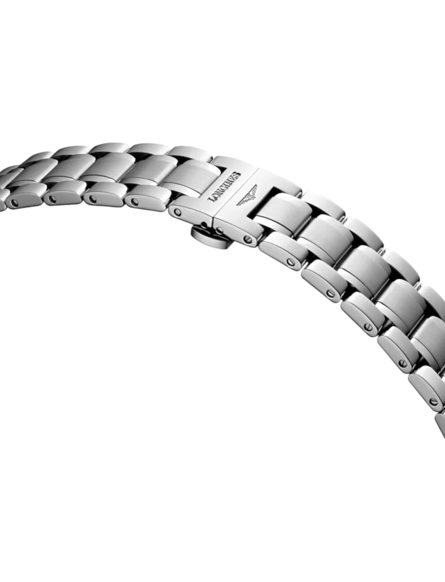 Close-up of a curved silver metal watch bracelet showing link joints and the Longines logo on the clasp.
