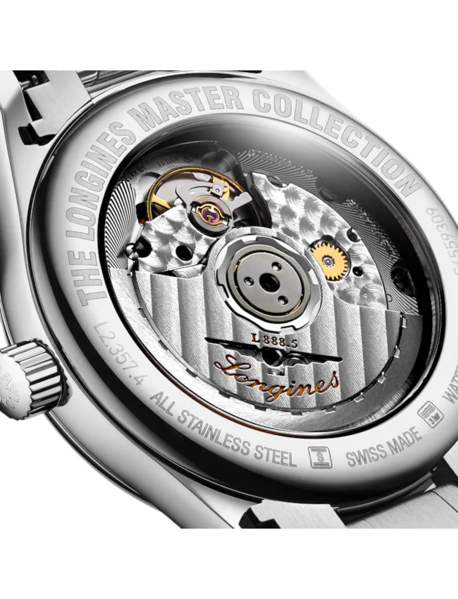 Close-up of a Longines Master Collection watch showing its exposed mechanical movement through the transparent case back, with engravings and gears visible.