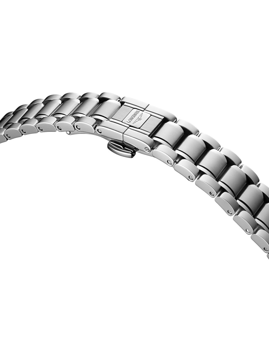 Close-up of a silver stainless steel watch bracelet curved across a white background