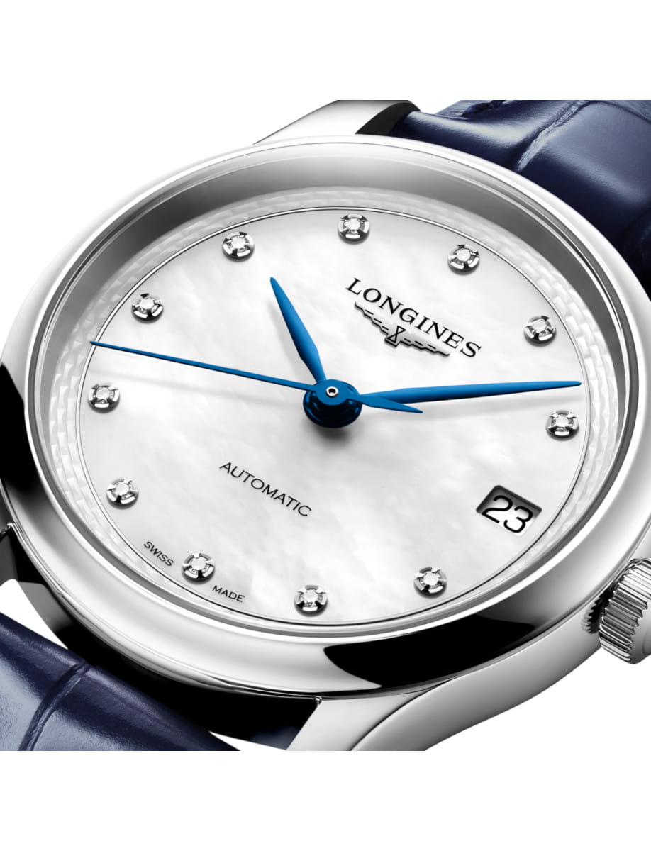 Longines automatic wristwatch with blue hands, diamond markers, and a date window at 3 o'clock on a white mother‑of‑pearl dial.