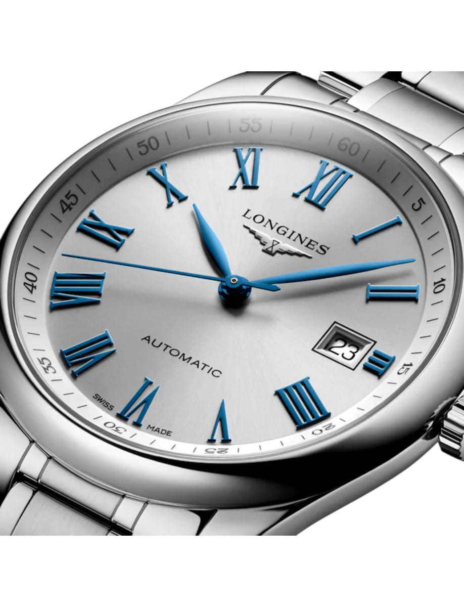 Silver Longines automatic wristwatch with blue Roman numerals and date window at 3 o'clock