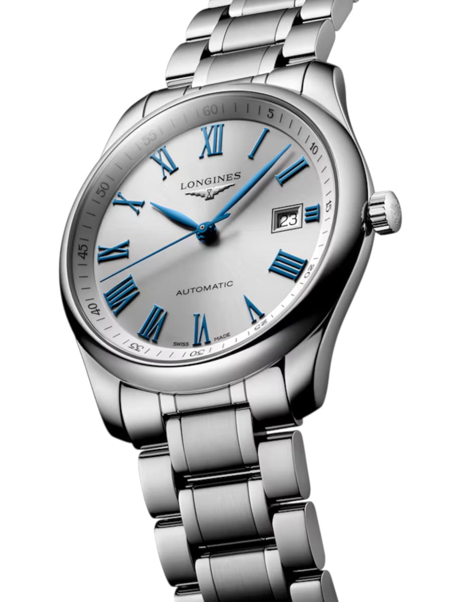 Longines stainless steel wristwatch with blue Roman numeral hour markers, date window, and matching bracelet.