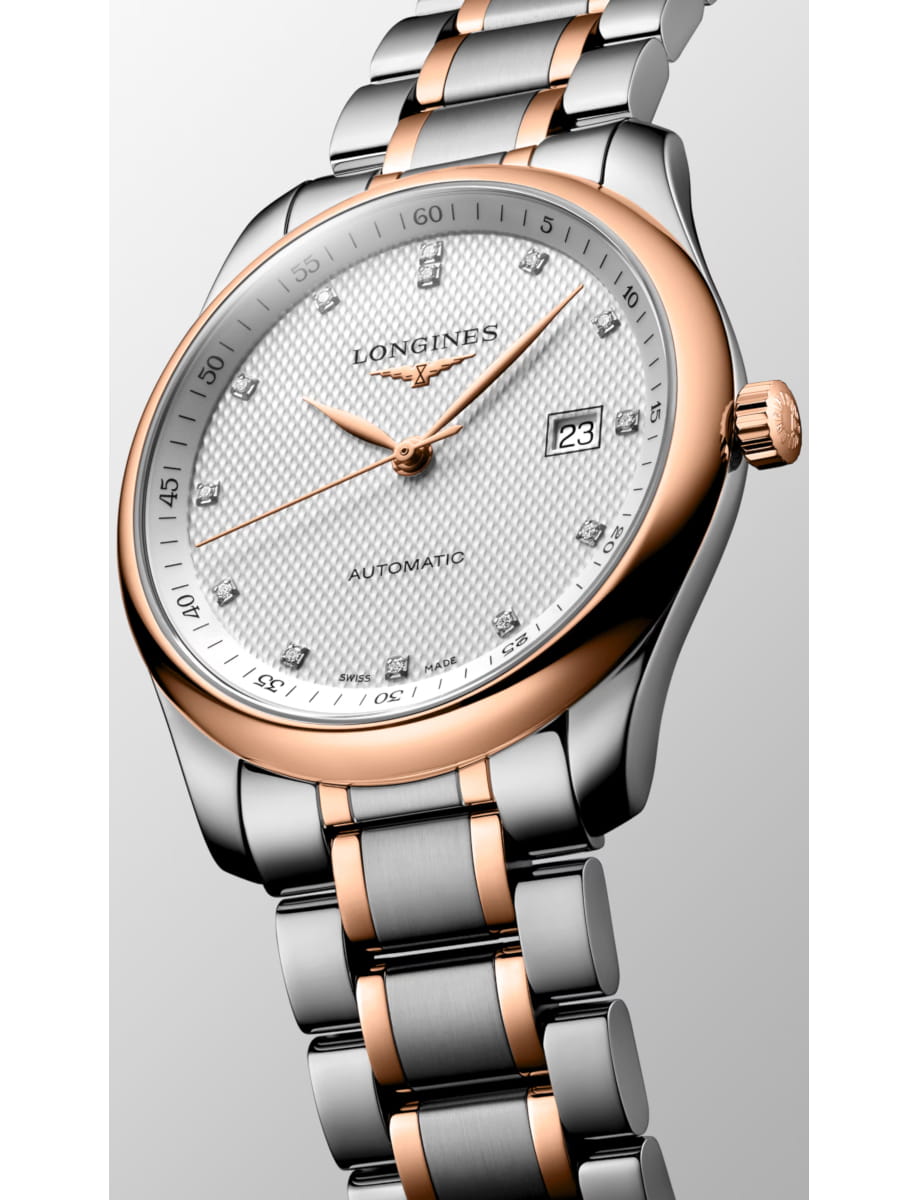 Two-tone silver and rose-gold Longines wristwatch with a textured white dial and date window.