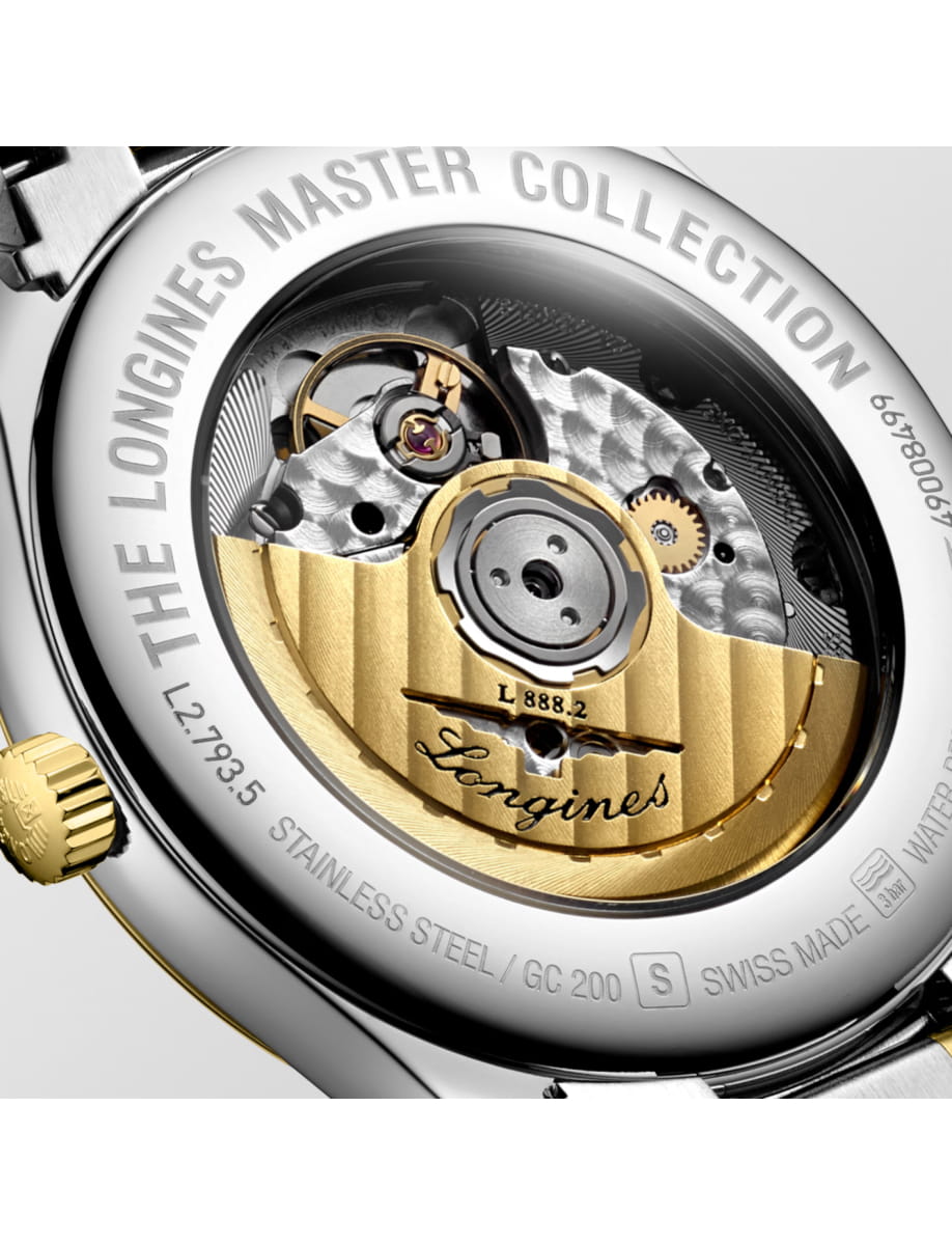 Close-up of a Longines Master Collection wristwatch caseback, revealing the gold rotor, gears, and engraved branding, including 'Longines Master Collection' and serial marks.