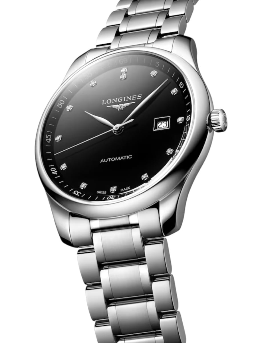 Longines automatic wristwatch with a black dial, diamond hour markers, date window, and stainless steel bracelet.