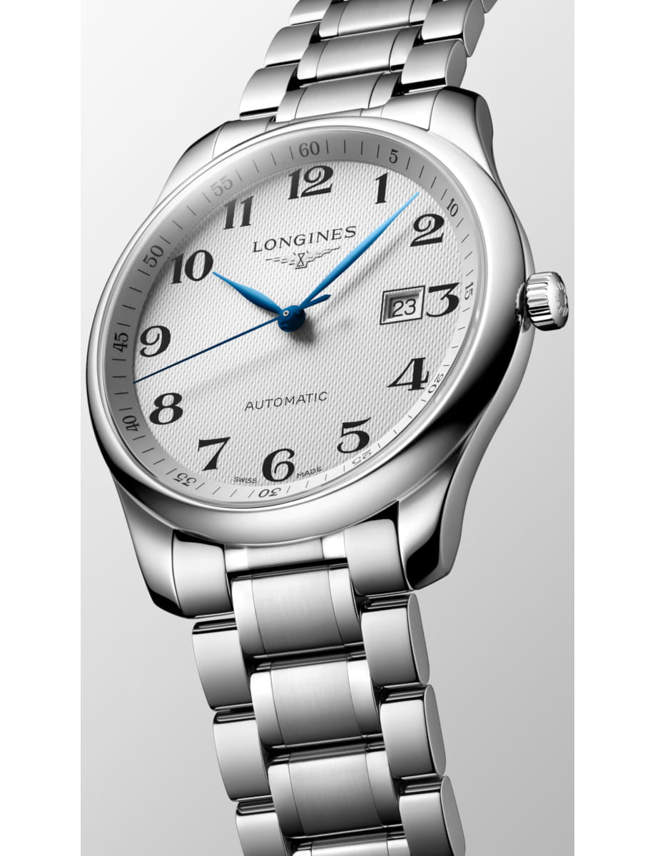 Side view of Longines wristwatch with stainless steel case and bracelet and silver dial