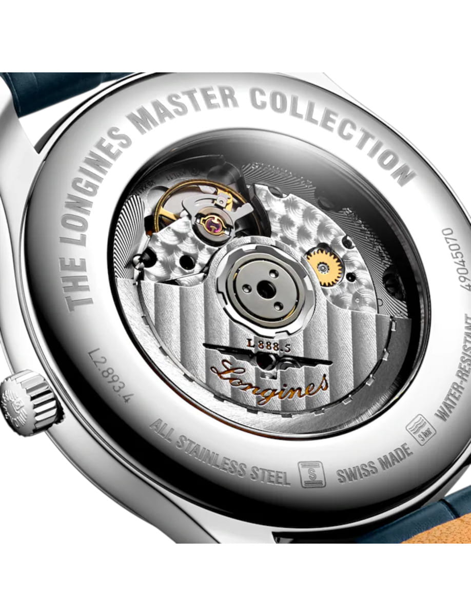 Close-up of the back of a Longines Master Collection watch, exposing the mechanical movement through the caseback with engraved branding.