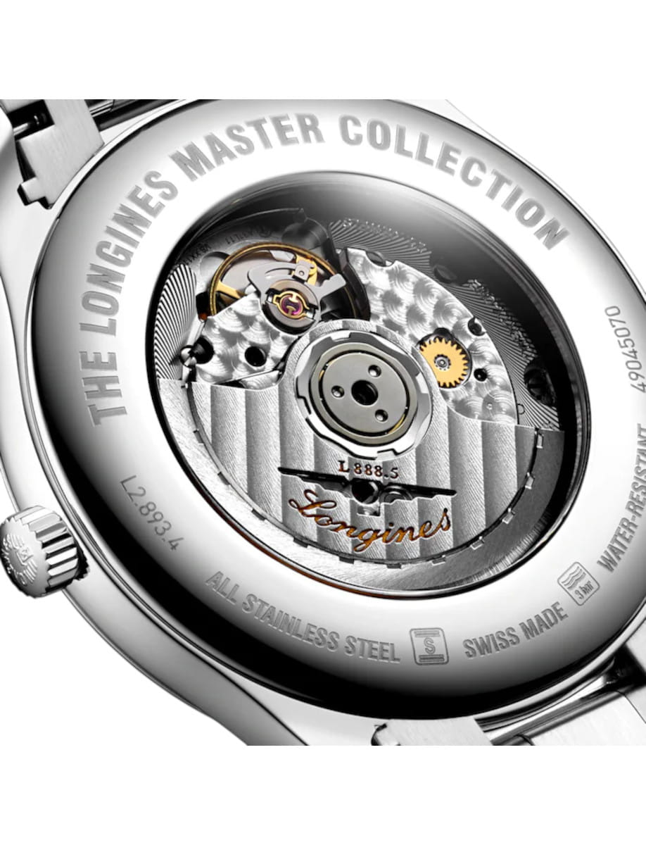 Close-up of a Longines Master Collection watch back, showing the automatic movement and engraved branding around the case.