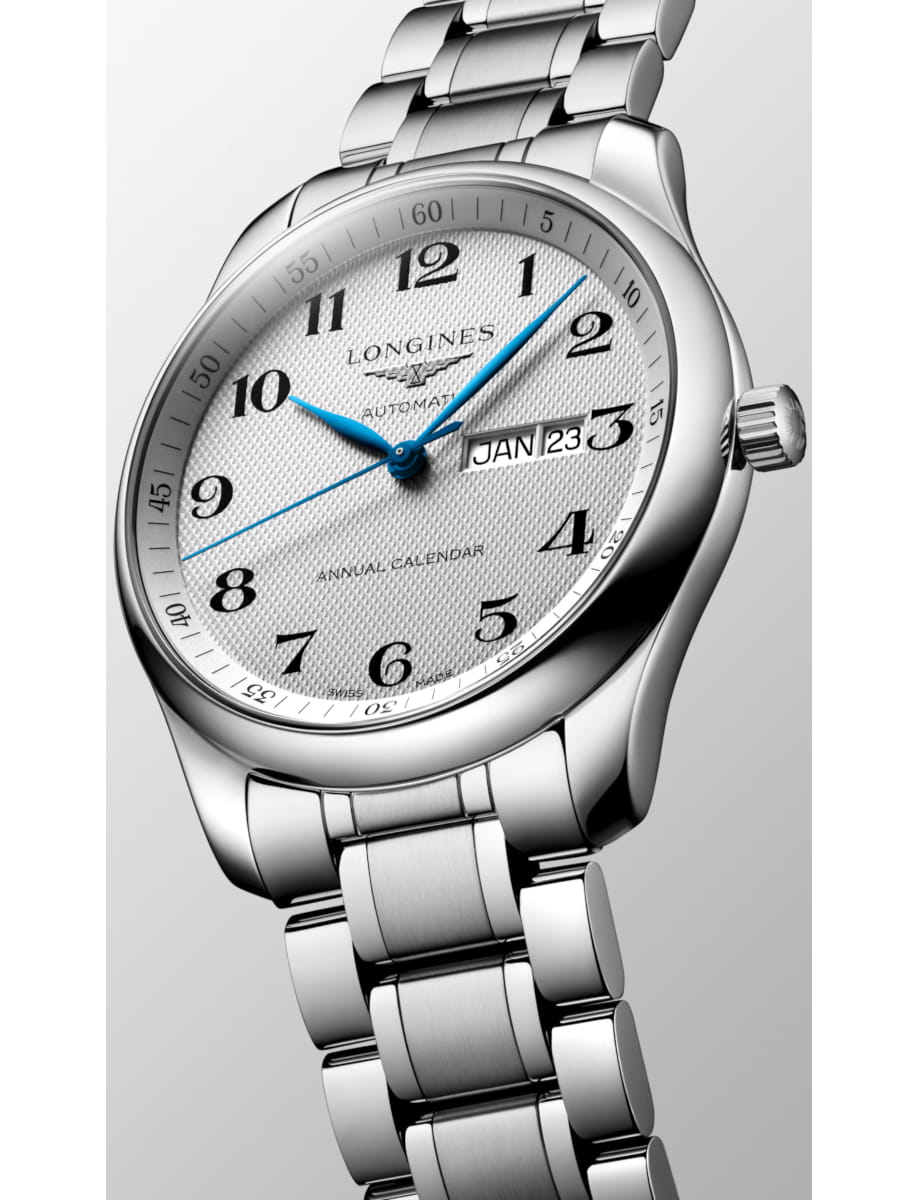 Side view of Longines wristwatch with stainless steel case and bracelet and silver dial