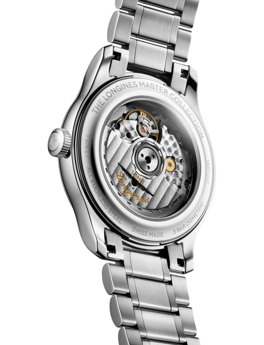 Back of a stainless steel Longines Master Collection watch with transparent caseback showing the automatic movement and rotor engravings.