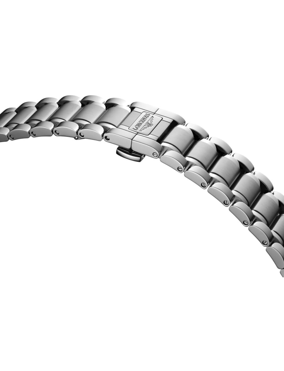Close-up of a steel metal watch bracelet with a deployment clasp.