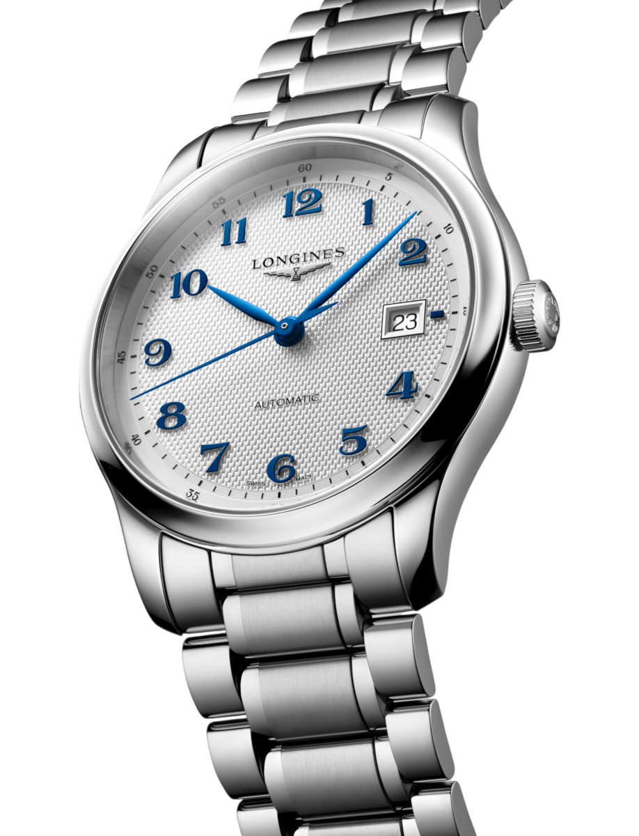 Side view of Longines wristwatch with stainless steel case and bracelet, and silver 
