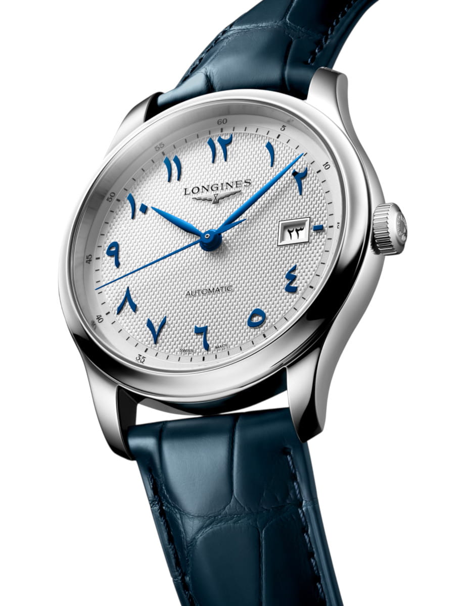 Longines automatic wristwatch with stainless steel case, white textured dial, blue Arabic numerals and hands, date window at 3 o'clock, blue leather strap