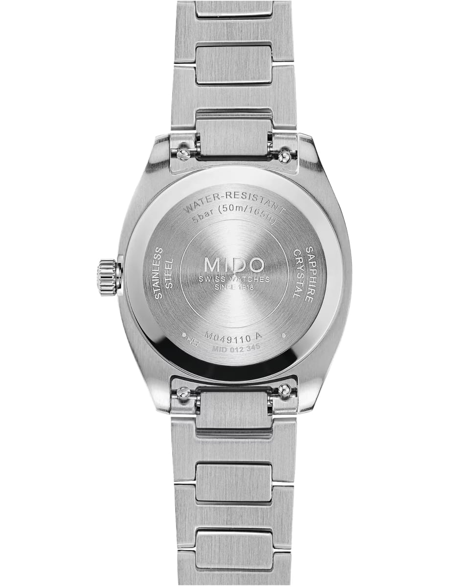 Back of a stainless steel MIDO wristwatch with an engraved case back and linked bracelet, showing water resistance and material info.