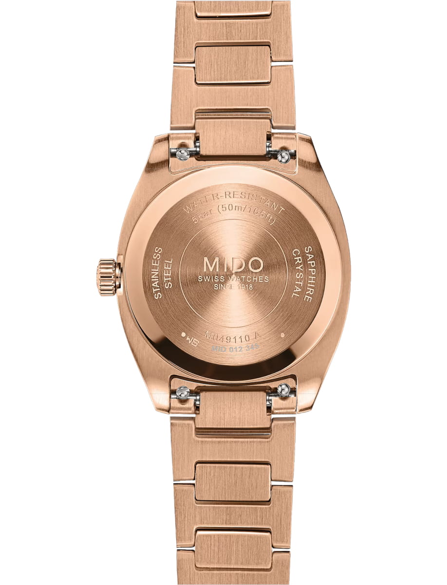 Rose gold stainless steel watch shown from the back, with engraved case back reading MIDO Swiss Watches and water resistance details.