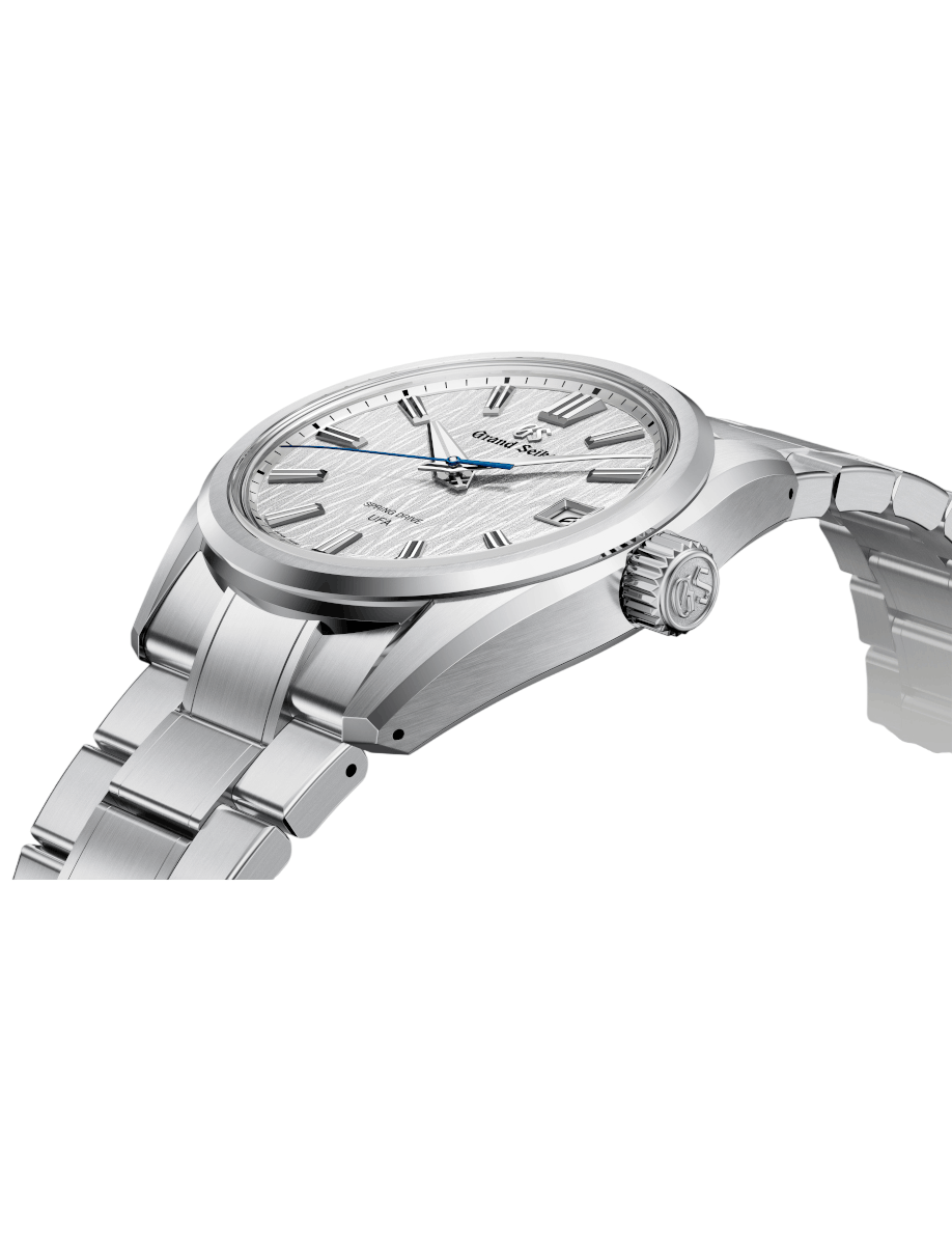 Side view of Grand Seiko wristwatch with Ever brilliant steel case and bracelet, and white dial.