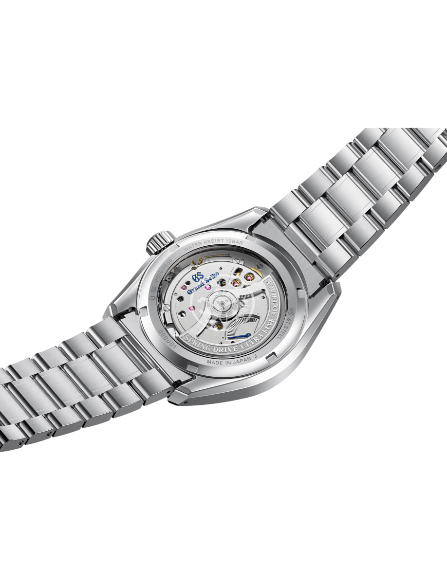 Back view of Grand Seiko wristwatch with Ever brilliant steel case and bracelet, and white dial.