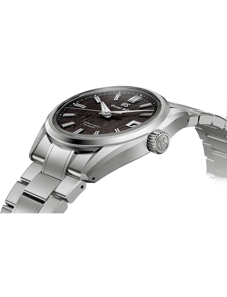Side view of Grand Seiko Evolution 9 wristwatch with high-intensity titanium case and bracelet, and deep black dial.