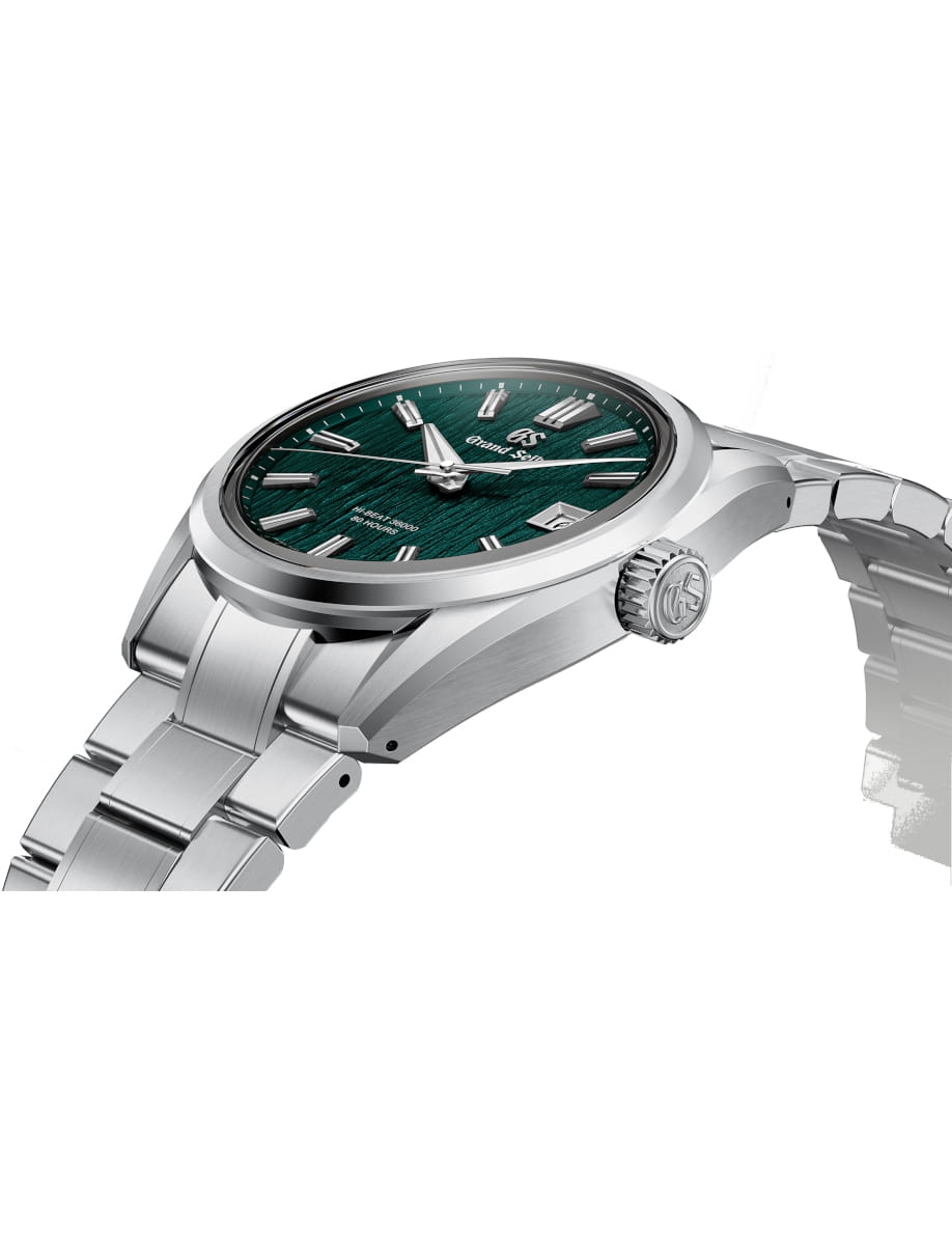Side view of Grand Seiko wristwatch with Ever brilliant steel case and bracelet, and green dial.