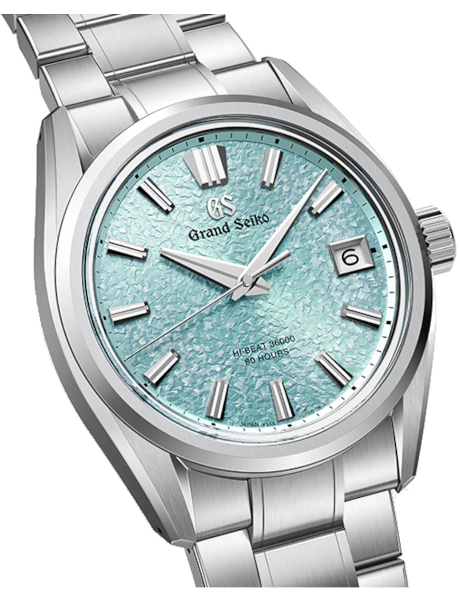 Front side view of Grand Seiko wristwatch with Ever brilliant steel case and bracelet, and light blue dial.