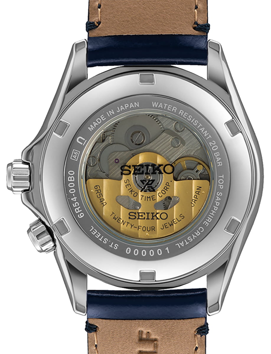 Stainless steel watch case back with a transparent window showing Seiko’s gold rotor and gears inside the movement