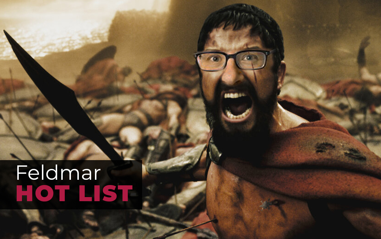Bearded man with glasses shouting in a war-torn battlefield; overlay text 'Feldmar HOT LIST'.] ,