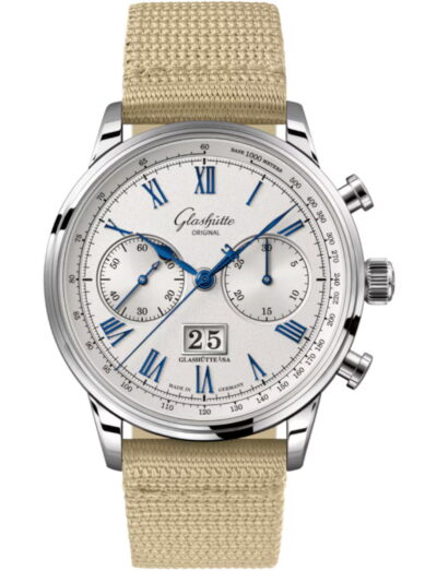 Silver stainless steel chronograph watch with blue hands and Roman numerals on a beige fabric strap