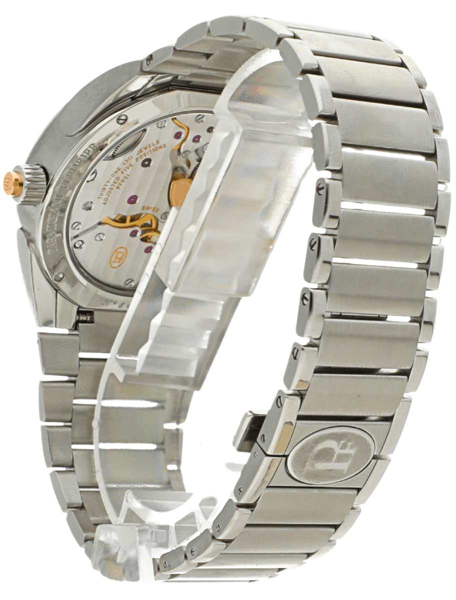 Pre-owned Parmigiani Fleurier stainless steel wristwatch with a transparent case back showing inner gears and jewels, mounted on a metal link bracelet.