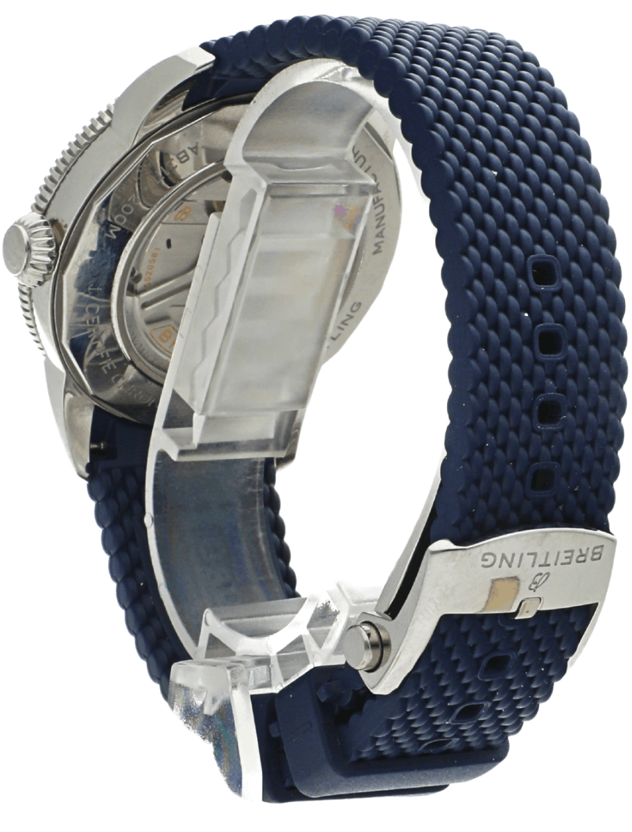 Side view of a pre-owned Breitling stainless steel wristwatch with a blue woven strap and deployment clasp.