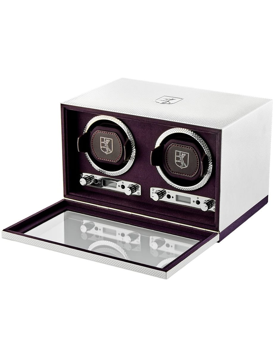Luxury two-slot watch winder with white exterior and purple interior, open to reveal circular rotating cushions and controls on a mirrored tray.