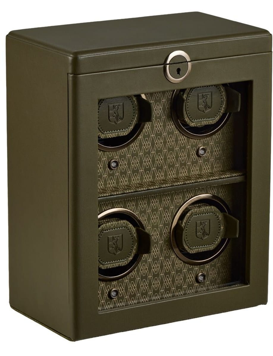 Olive-green compact safe with a top keyhole lock and four combination dials visible inside.
