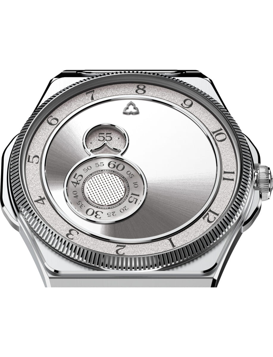 Close-up of a stainless steel watch case back with a knurled bezel and concentric timing discs