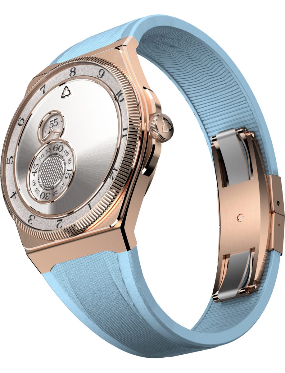 Rose gold luxury wristwatch with a light blue strap, angled view showing crown and subdials for chronograph detail.