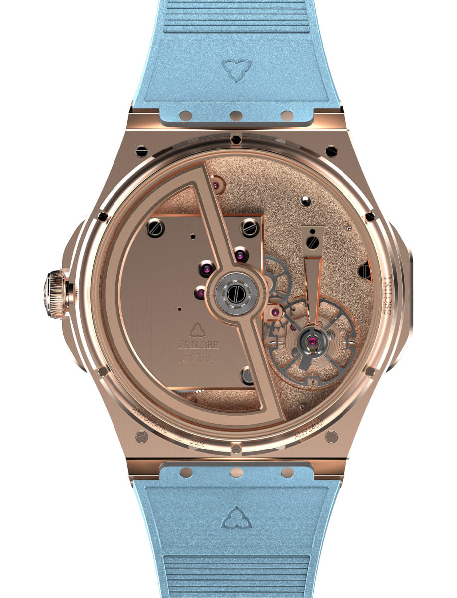 Back view of a rose-gold mechanical wristwatch with an exposed movement and rotor, set against a light blue strap.